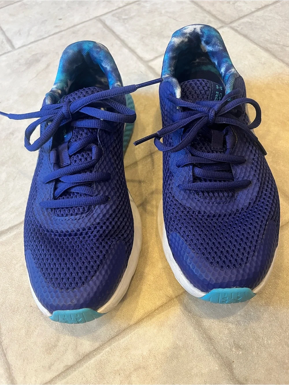 Under Armour Charged Rogue running shoes. Purple and teal. 6y or 7.5-8 women.